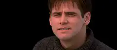 Jim Carrey laughing and bowing
