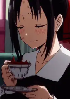 Miyuki holding a chocolate dessert