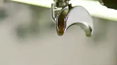espresso dripping from portafilter