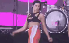 Dua Lipa dancing on stage