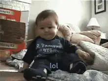 Baby laughing and falling over