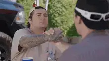Jonah Hill doing a hand gesture