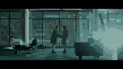 couple holding hands in office at night
