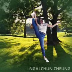 Woman doing splits in park