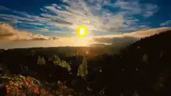 Bitcoin sun over mountain landscape