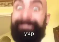 Bald man with beard saying yup