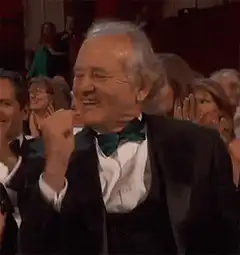 Bill Murray smiling and clapping