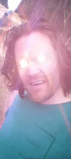 Man with glowing eyes Bitcoin
