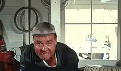 Man smashes through wall