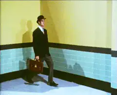 Man kicks wall in hallway
