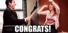 Michael Scott sprays Pam with champagne