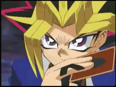 Yugi plays a card
