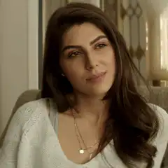 Woman saying maybe with skeptical face
