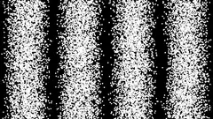 falling white dots on black background