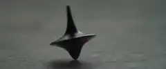 black spinning top