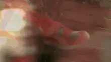Red hot dog person dancing in park