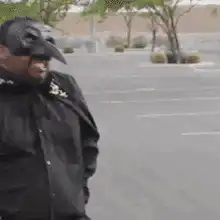 Plague Doctor dancing in parking lot