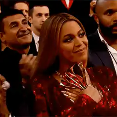 Beyonce holding Grammy award