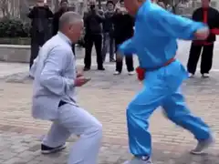 Two men practicing martial arts