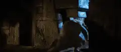 R2-D2 crawls under a door