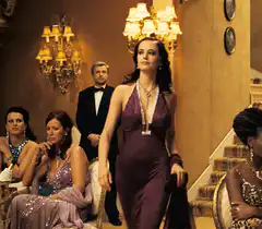 Vicki Vale walks through the mansion