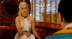 Daenerys Targaryen sitting on a couch