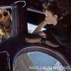 Woman in space looking at reflection