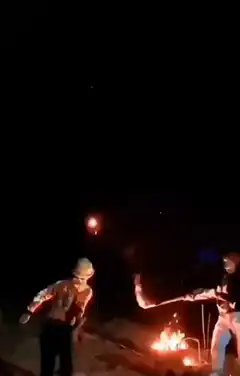 man gets hit by firework explosion