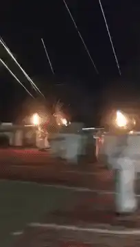 Fire dancers with fireworks