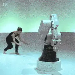 Woman dancing with robotic arm