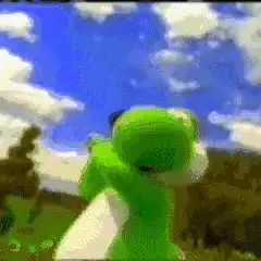 green frog holding phone
