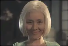 Yuri smiling then turning away