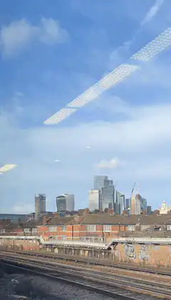 London skyline from train window