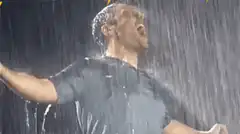 Man screaming in the rain with lightning