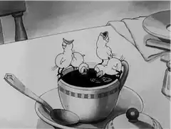 Chicks drinking coffee from a cup