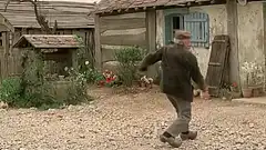 Old man drinks and eyes pop out