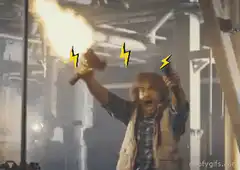 Man firing two guns with lightning bolts