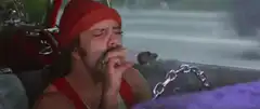 Elvis smoking in a car