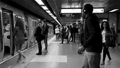Woman dancing on subway platform