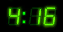 Digital clock changing time and color