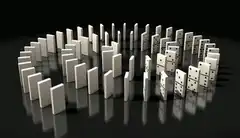 Dominoes falling in a spiral