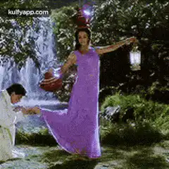 Woman balancing pots on head