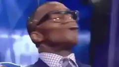 T.I. head tilt and smile