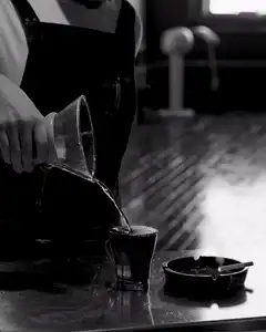 pouring drink into glass