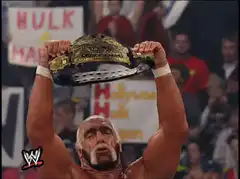 Hulk Hogan raises championship belt