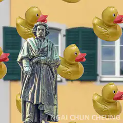 Beethoven statue surrounded by golden ducks