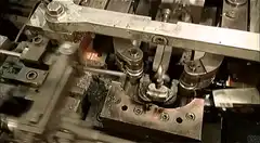 Industrial machine making metal parts
