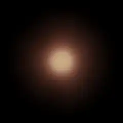 Bitcoin coin glowing in light