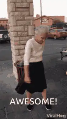 Old lady throws trash in bin