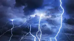 Multiple lightning bolts in stormy sky